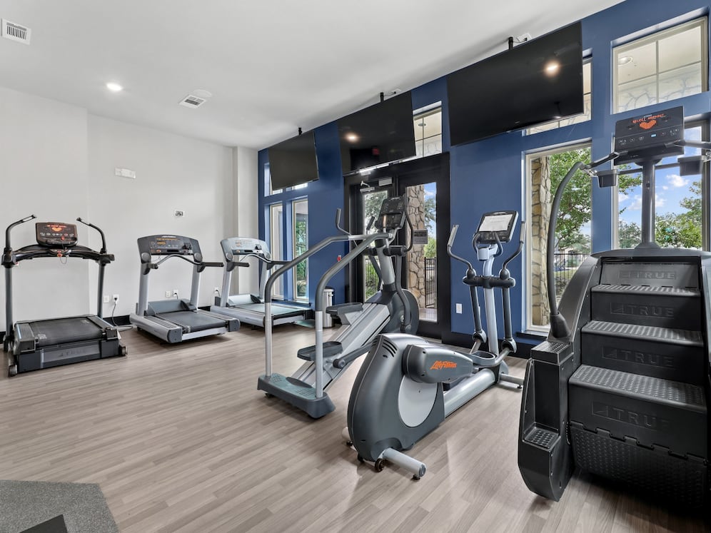 State-of-the-art fitness center with cardio equipment