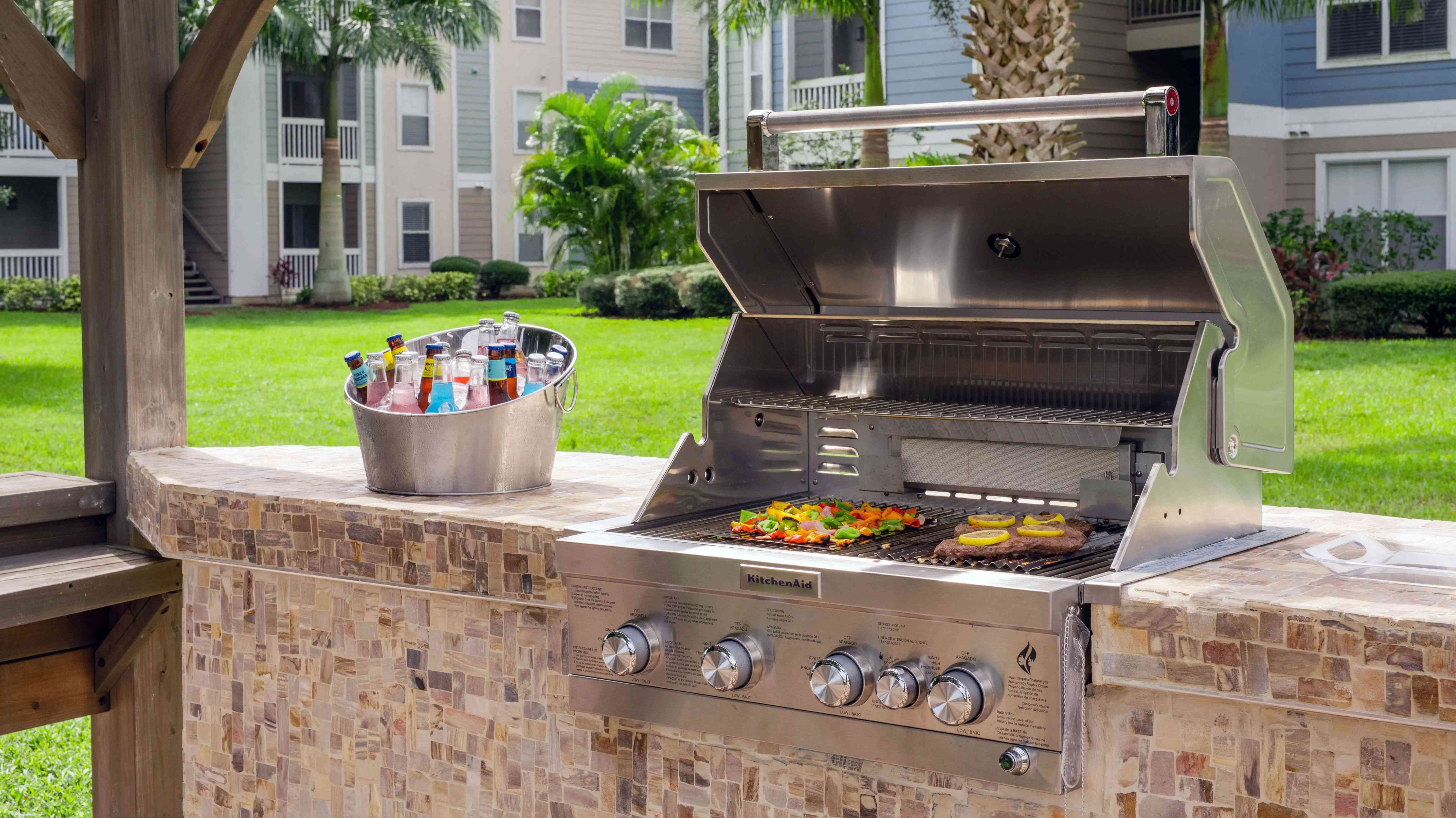 Host cookouts and show off your grilling finesse at the fully equipped outdoor kitchen. 
