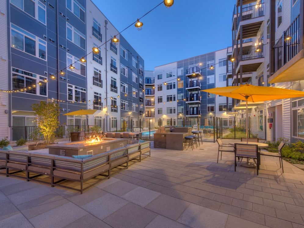 Outdoor chill lounge with fireplace and lounge seating