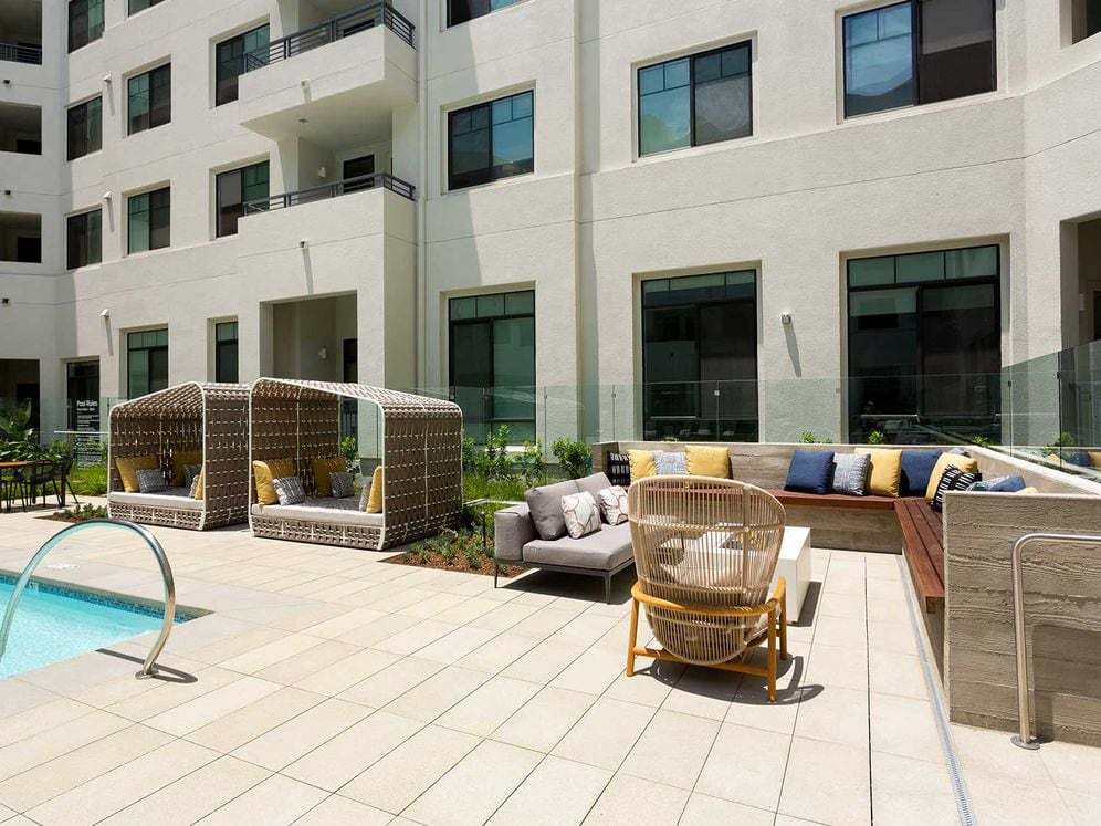 Sundeck with lounge seating and cabanas