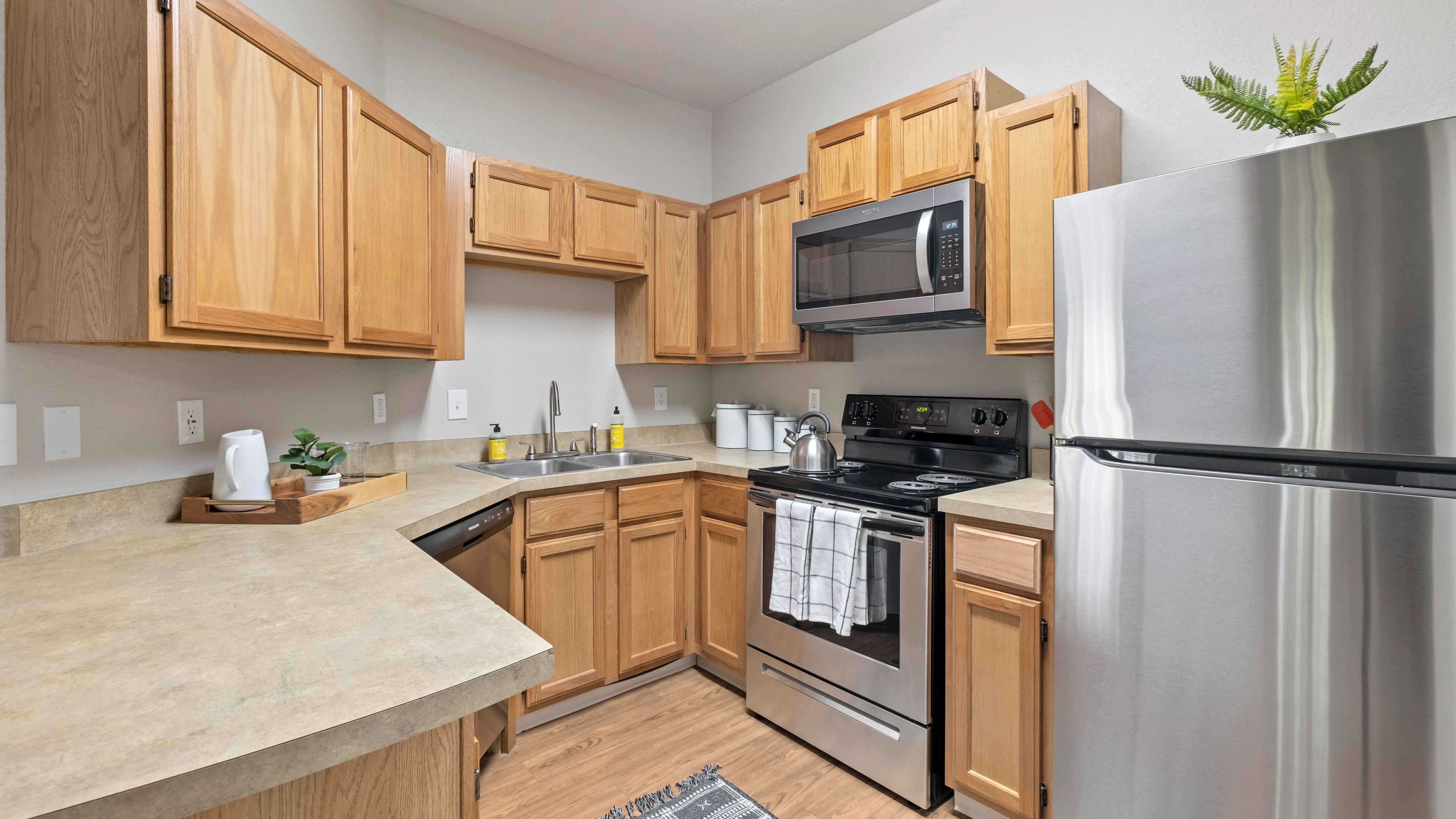 Indulge in the epitome of culinary comfort. Our classic-style kitchen beckons with ample storage and modern stainless-steel appliances. 