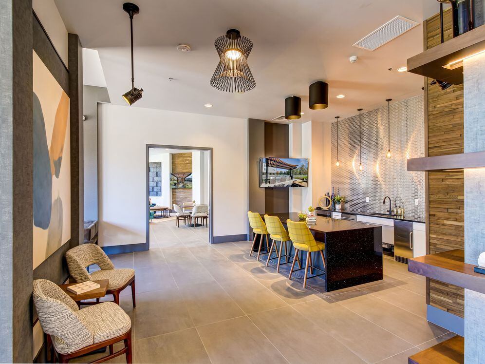 Resident's lounge with entertaining kitchenette and flat-screen television