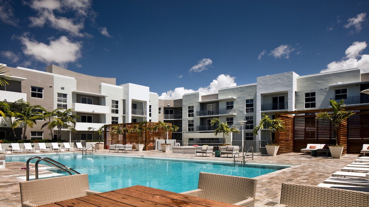 Hotel-inspired pool and sundeck with cabanas.
