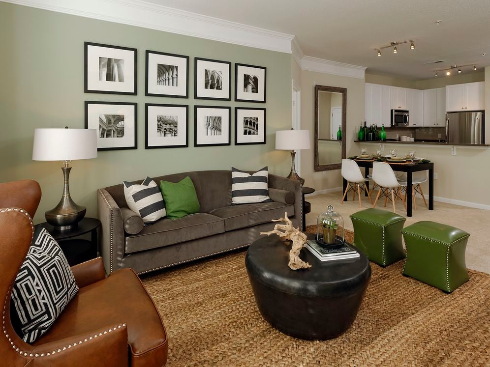 Dining and living area with carpet