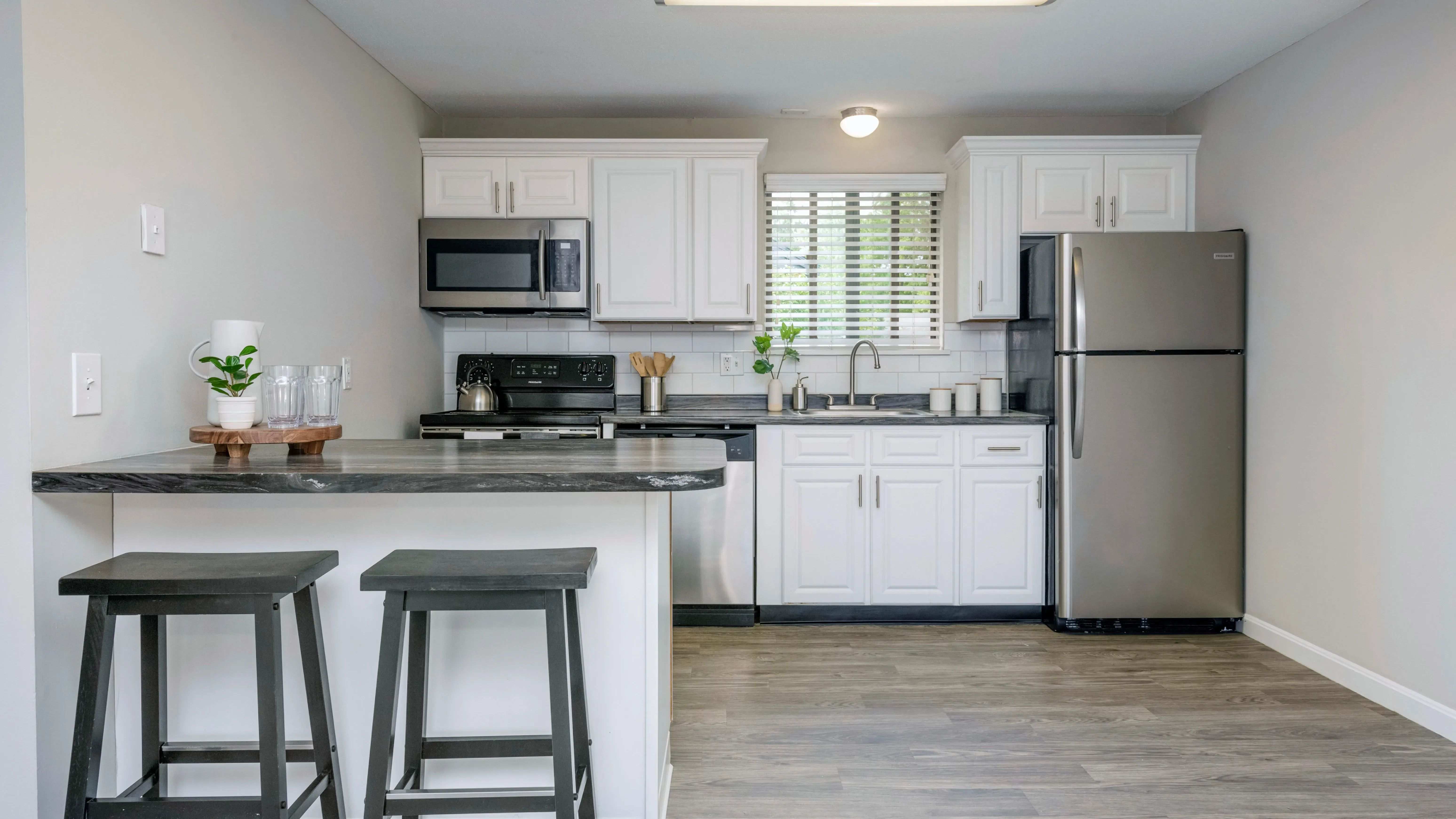 Elevate your daily life with modern kitchens featuring stainless steel appliances and an open-concept layout.