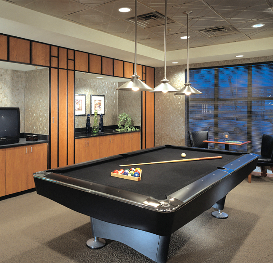 Unleash Your Competitive Spirit in Style: The Billiards Room at Mill City Apartments is the ultimate hub for socializing, sharpening your skills, and enjoying endless hours of friendly competition.
