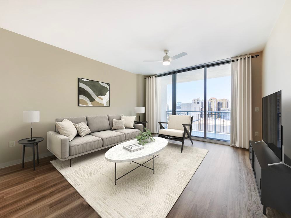 Tower Building - Renovated living room with hard surface flooring