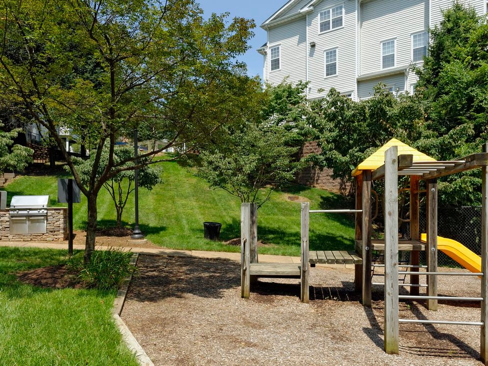 Courtyard greenspace with playground and pathway