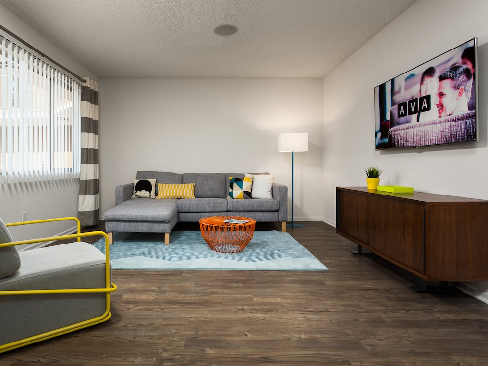 Classic Package II living area with hard surface flooring (select homes)