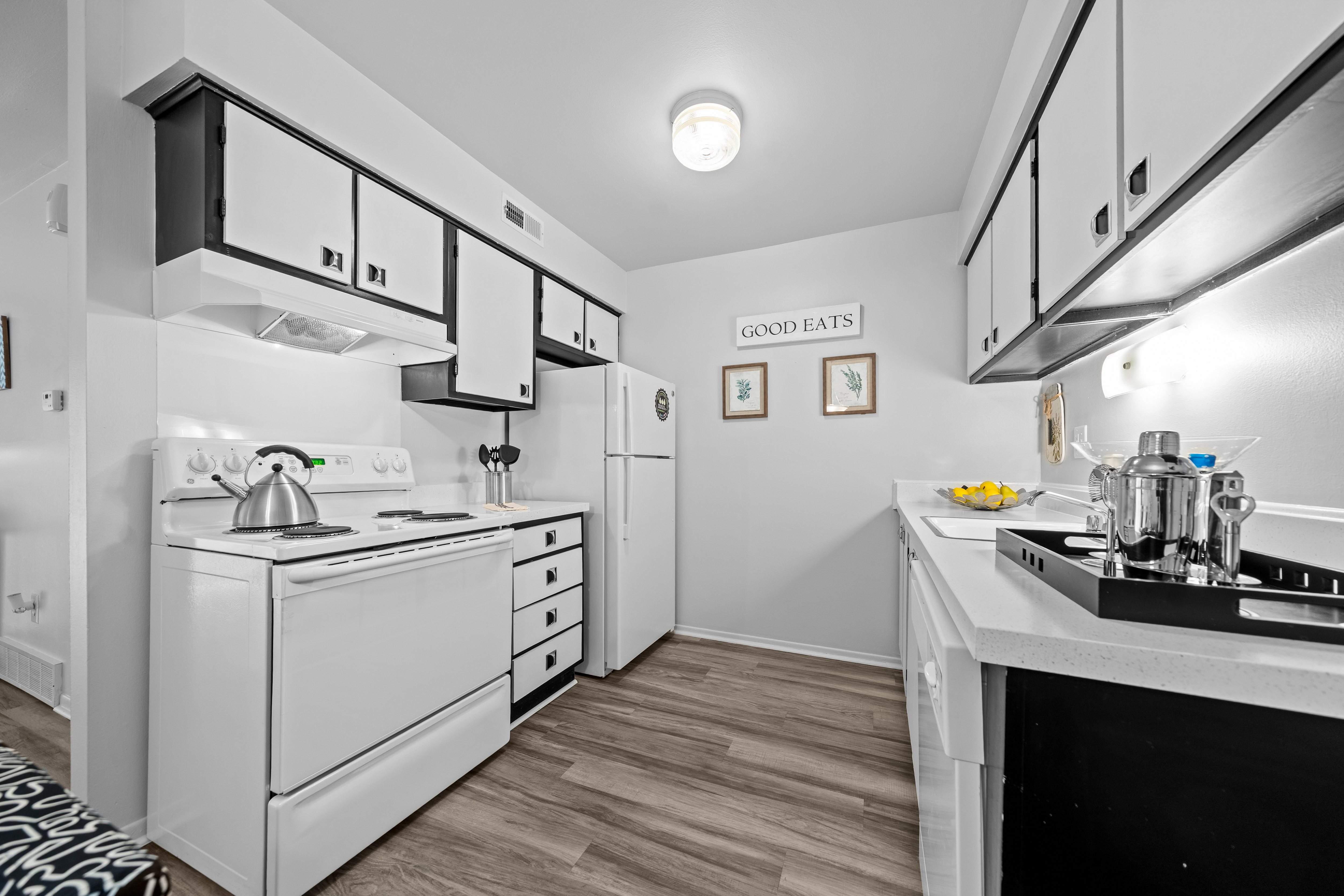 A modern kitchen at Westwood Village Apartments in Westland