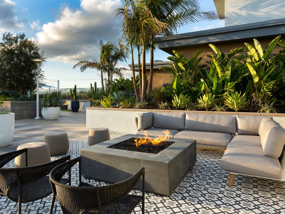 Building B rooftop with fireplace and lounge seating