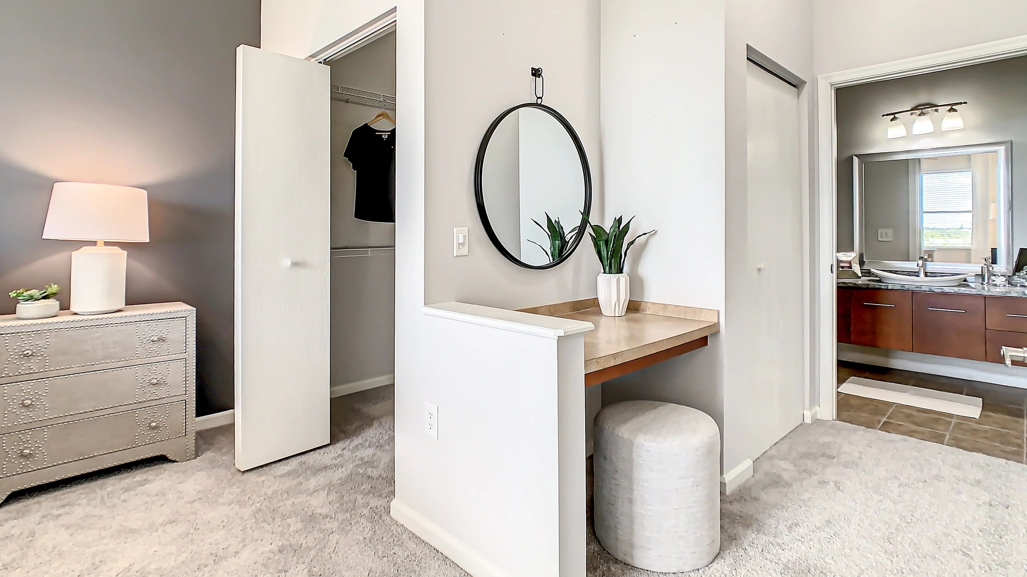 Experience luxury with an added vanity area in the primary bedroom's hallway, leading to magnificent primary bath, an ultimate pampering retreat. 