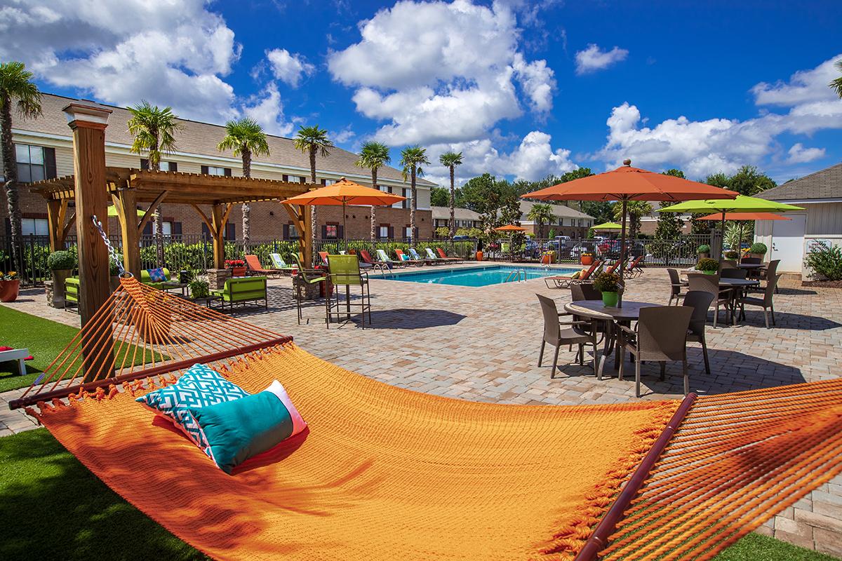 Soak in the sun on one of our poolside hammocks at our expansive sundeck.