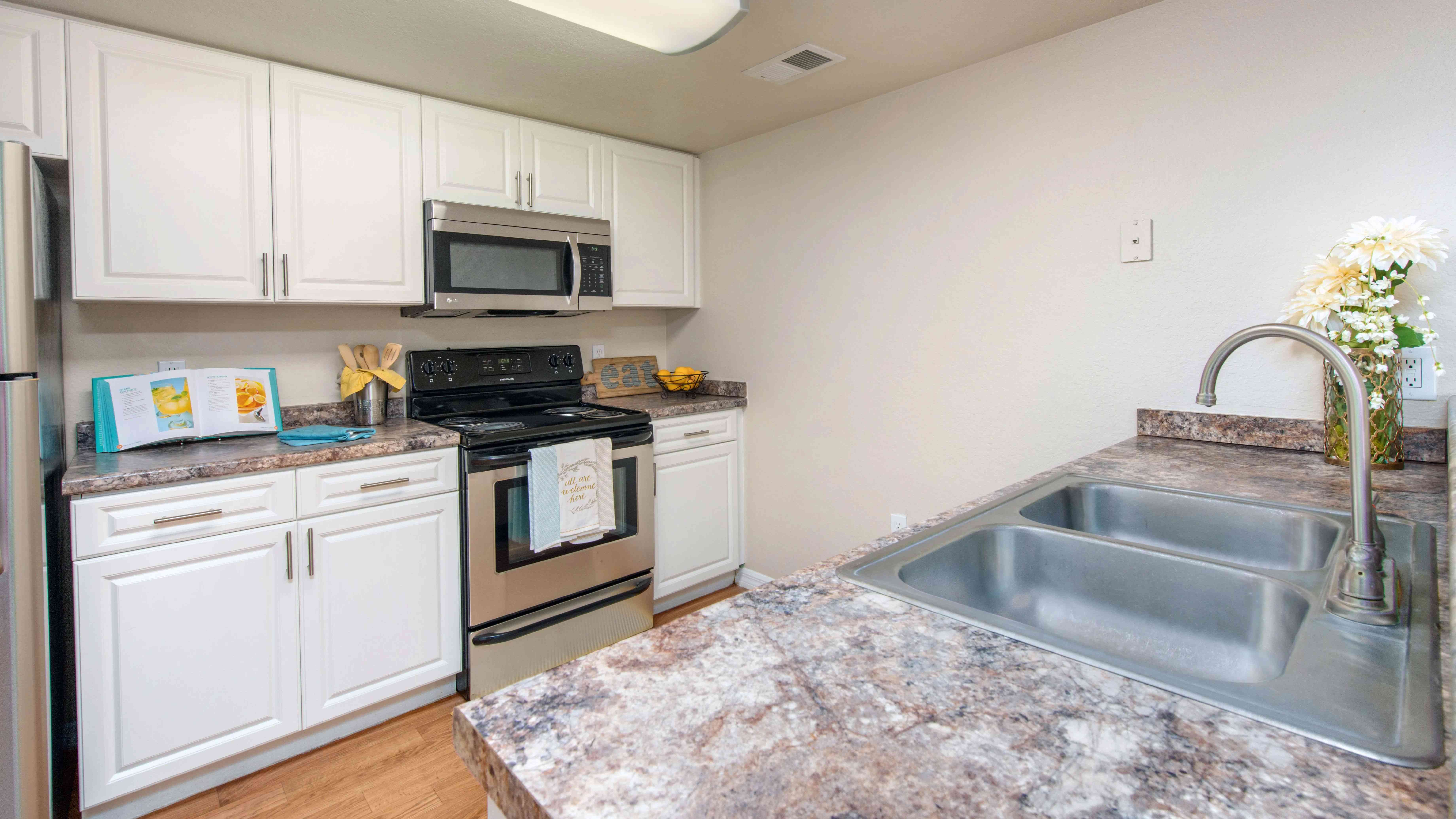 Indulge in our spacious, well-equipped kitchens, your hub for culinary creativity.