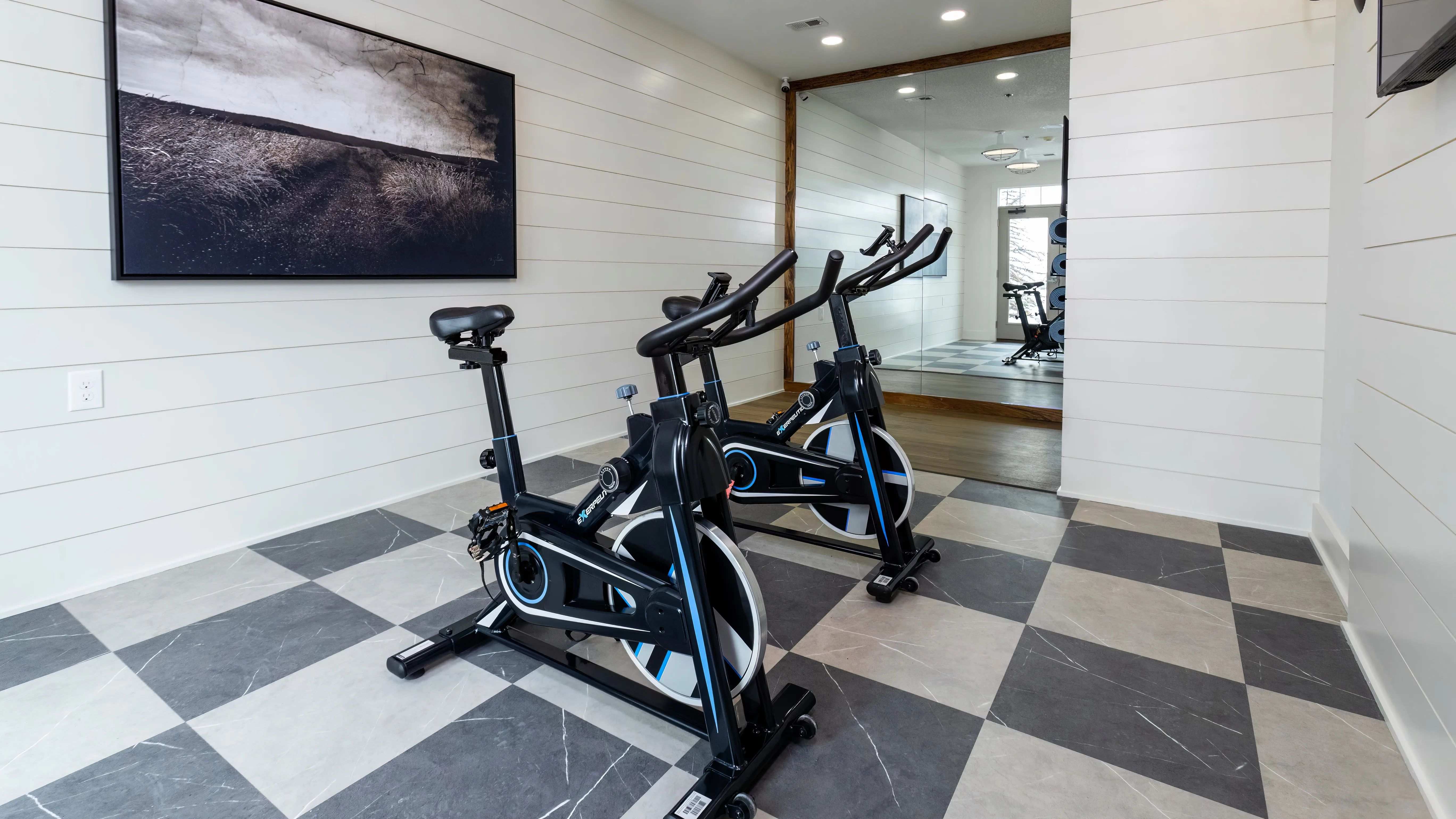 Cycle enthusiasts can enjoy a dedicated spin studio adjacent to the fitness center, providing an immersive workout experience.