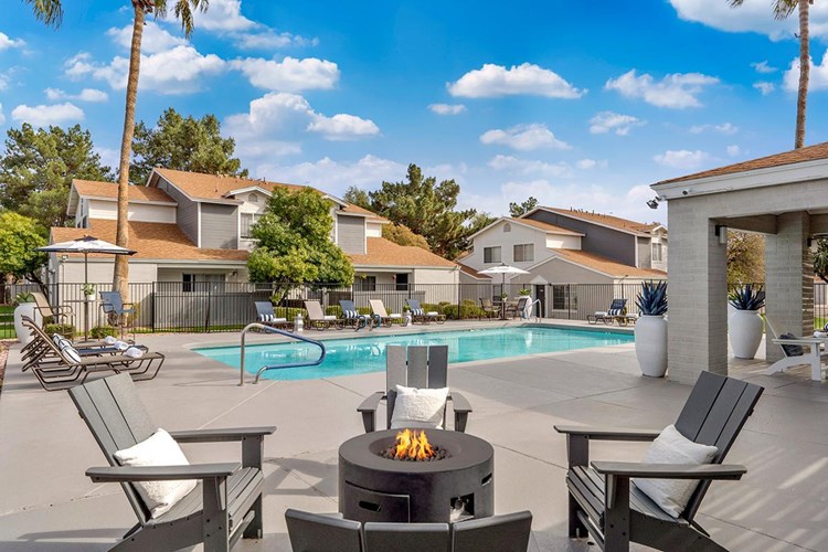 Warm up around our poolside firepit.