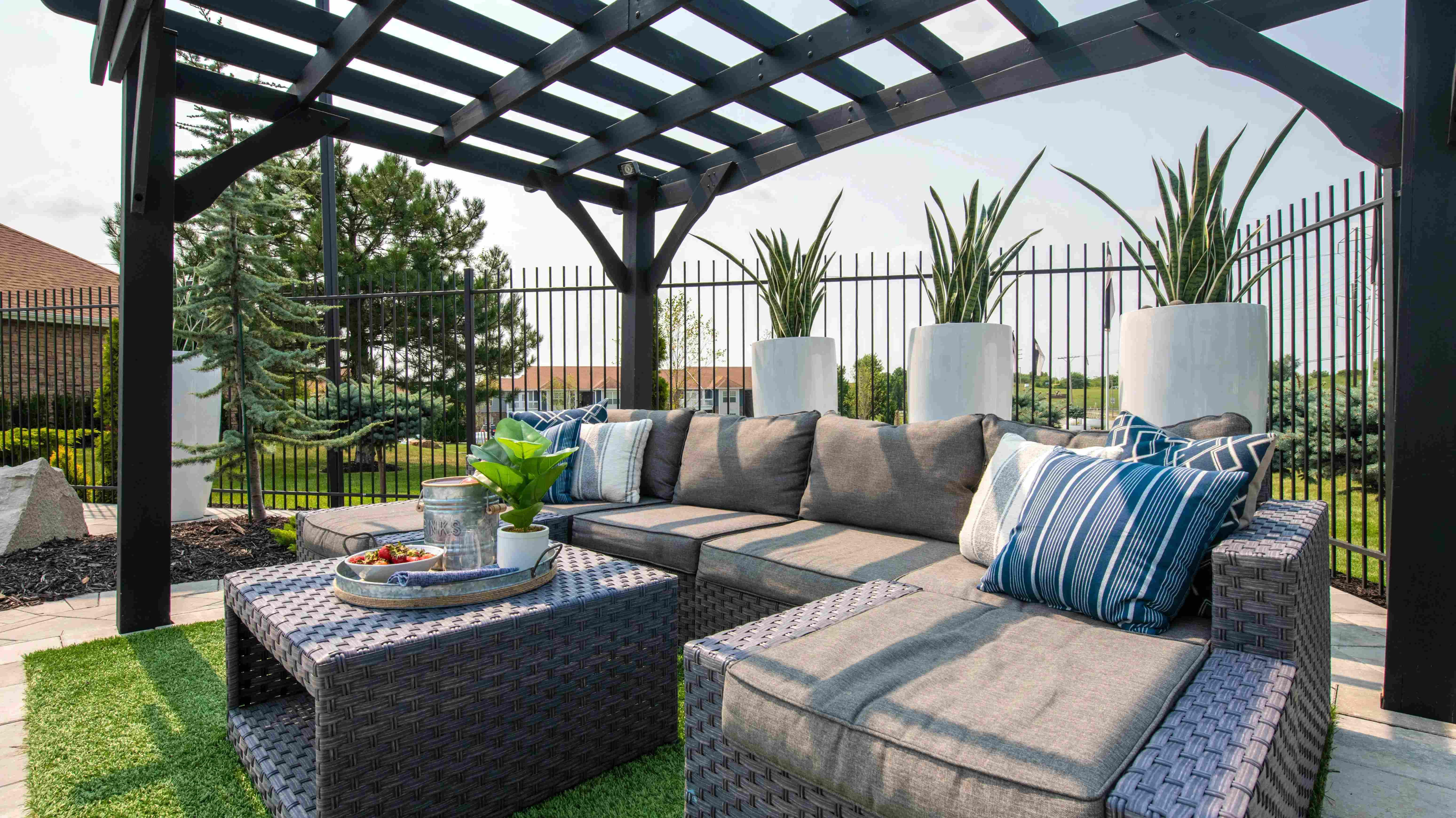Relax under the poolside pergola, offering shaded tranquility and plush loungers for a luxury-filled escape on the deck.  