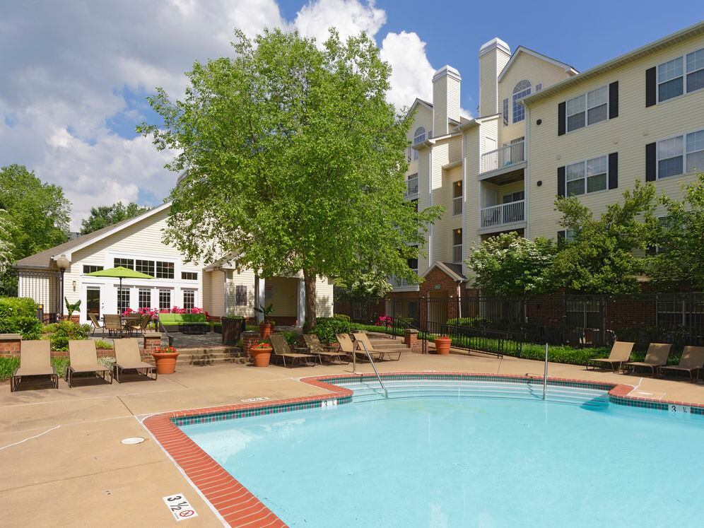 Swimming pool and sundeck with lounge seating