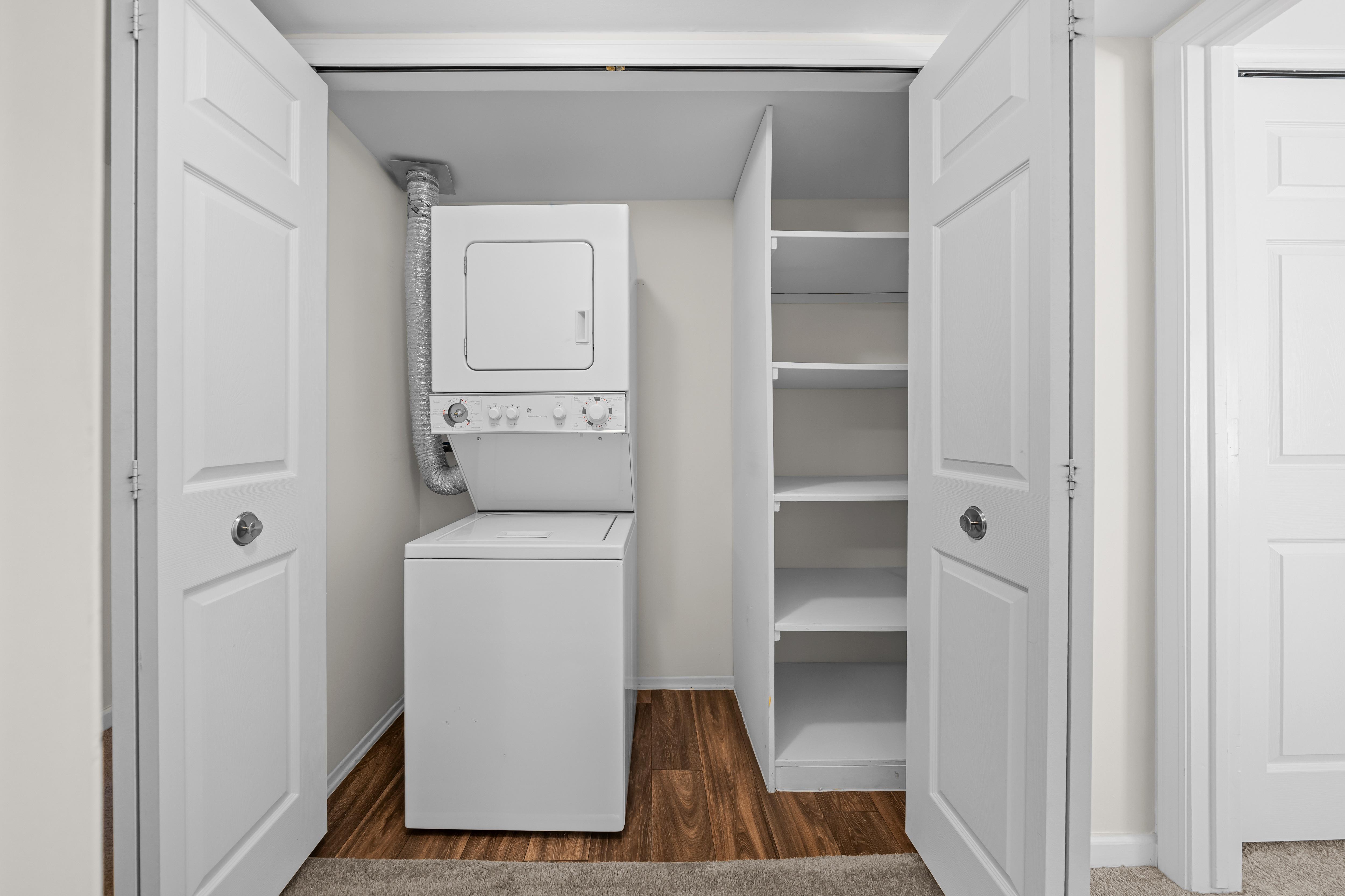 Spacious In-unit Laundry and Linen Closet at Lakeside Village Apartments Clinton Township MI