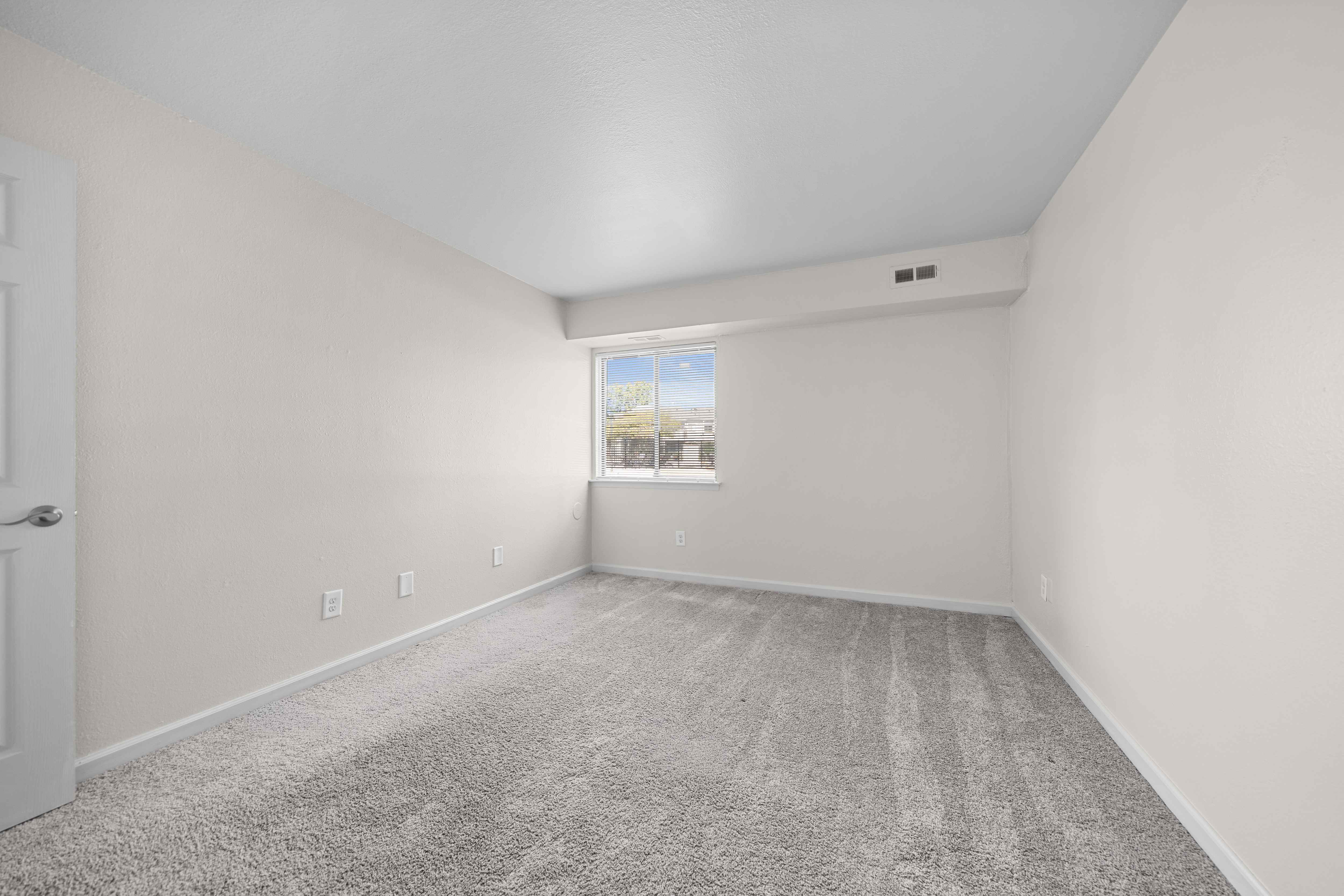 Large bedroom at Three Oaks Apartments in Troy, MI