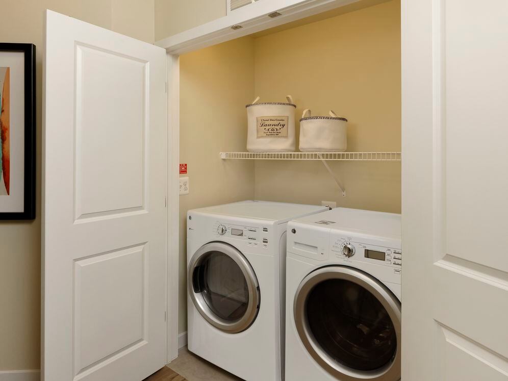 In-unit washer and dryer with storage space