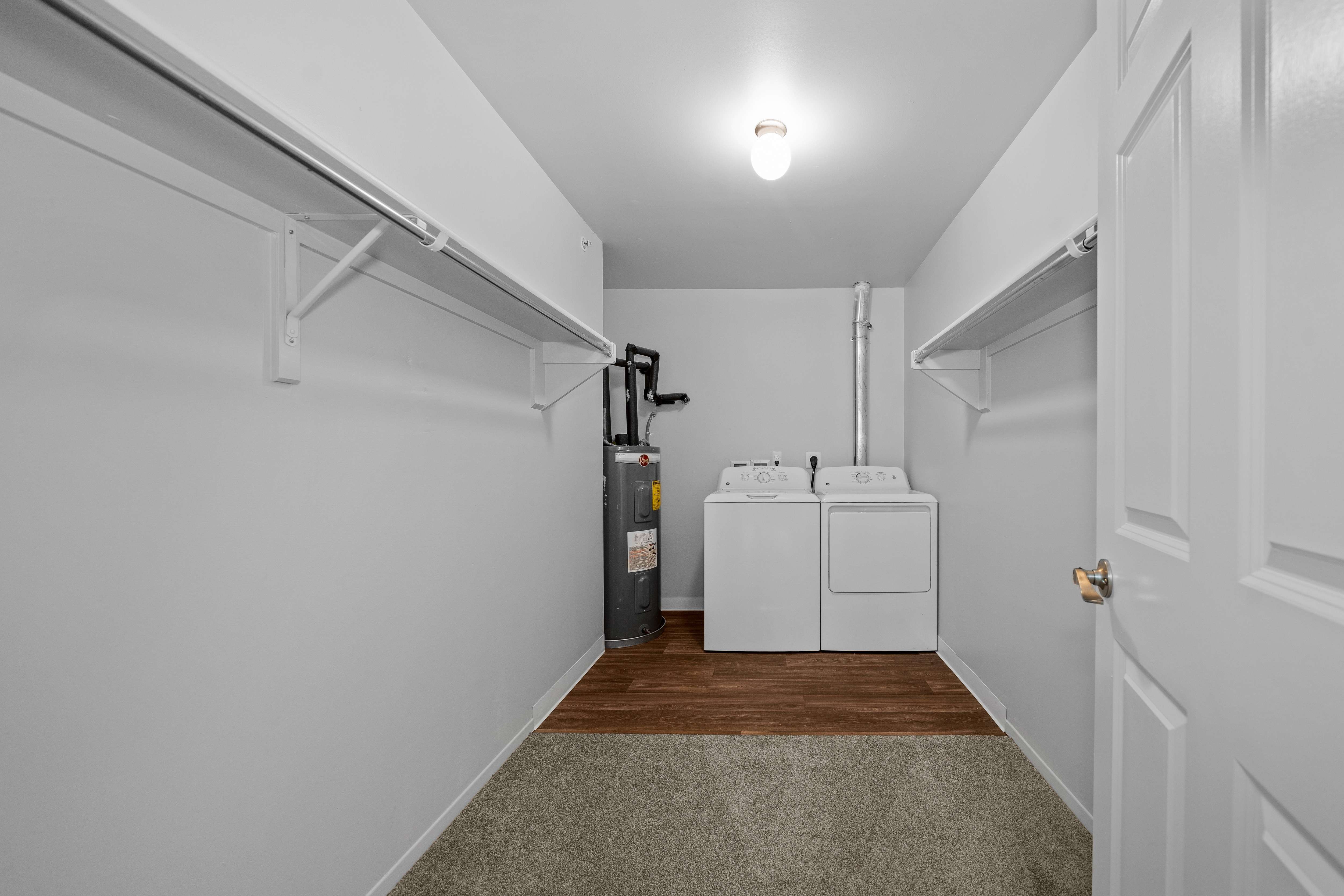 Ample storage space with in-unit washer/dryer at Woodland Villa Apartments in Westland, MI.