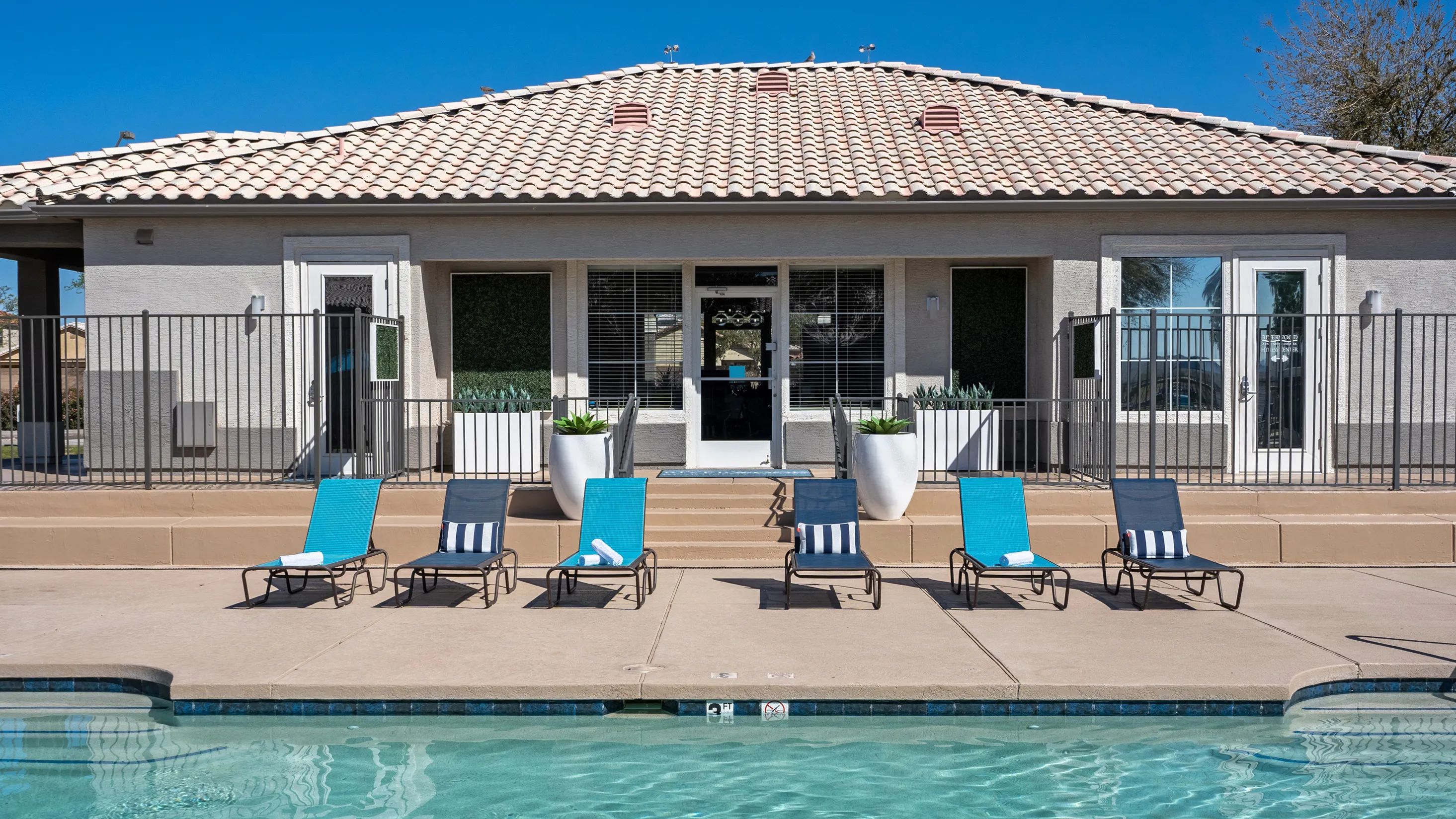 Lay back and soak up the Arizona sunshine on our vibrant poolside loungers, your personal ticket to paradise at home. 