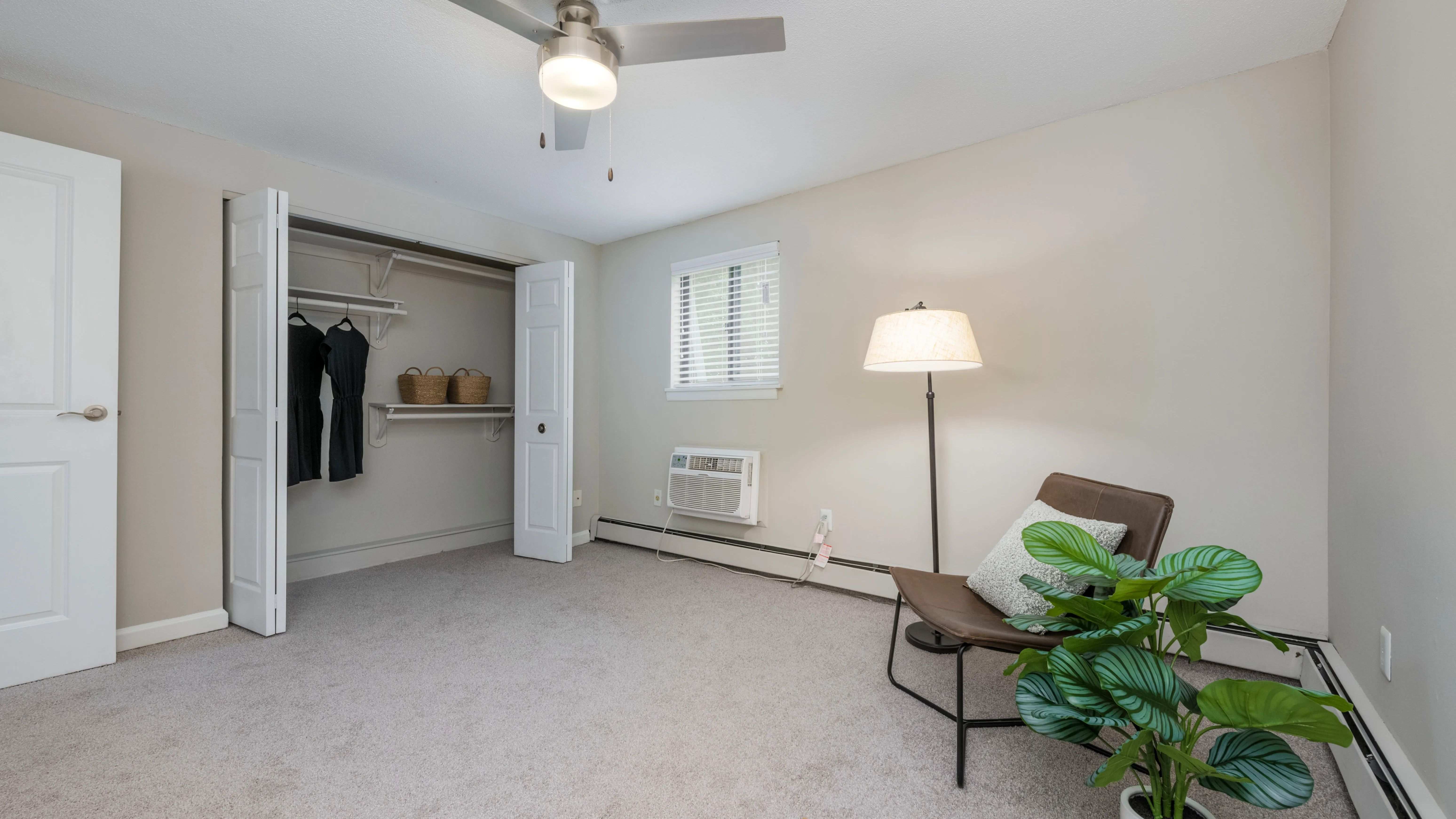 Closet organizers in our bedrooms provide spacious and organized wardrobe storage with double bi-fold doors and solid wood shelving to maximize your closet options.