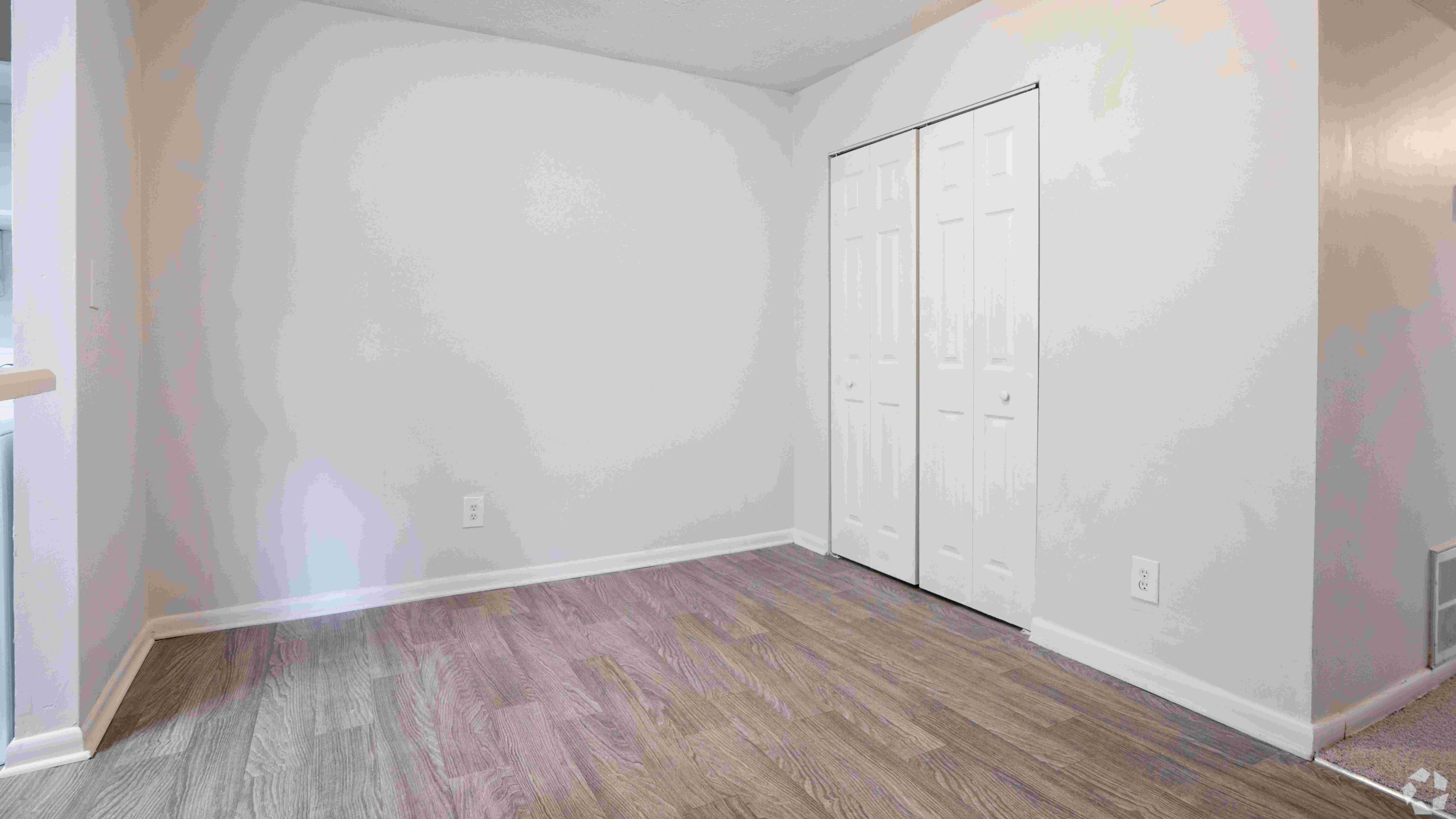 This space features modern flooring and a versatile layout, perfect for everyday meals or hosting small gatherings.