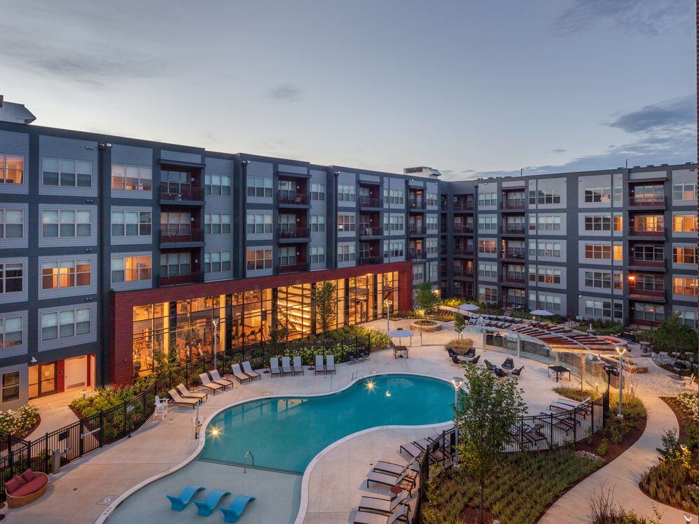Sundeck with grills, dining and seating areas