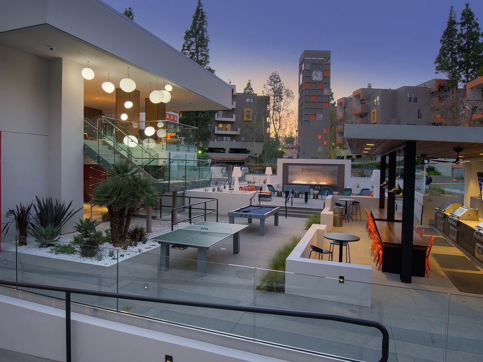 Outdoor Lounge with Seating Fire Pit and Game Tables