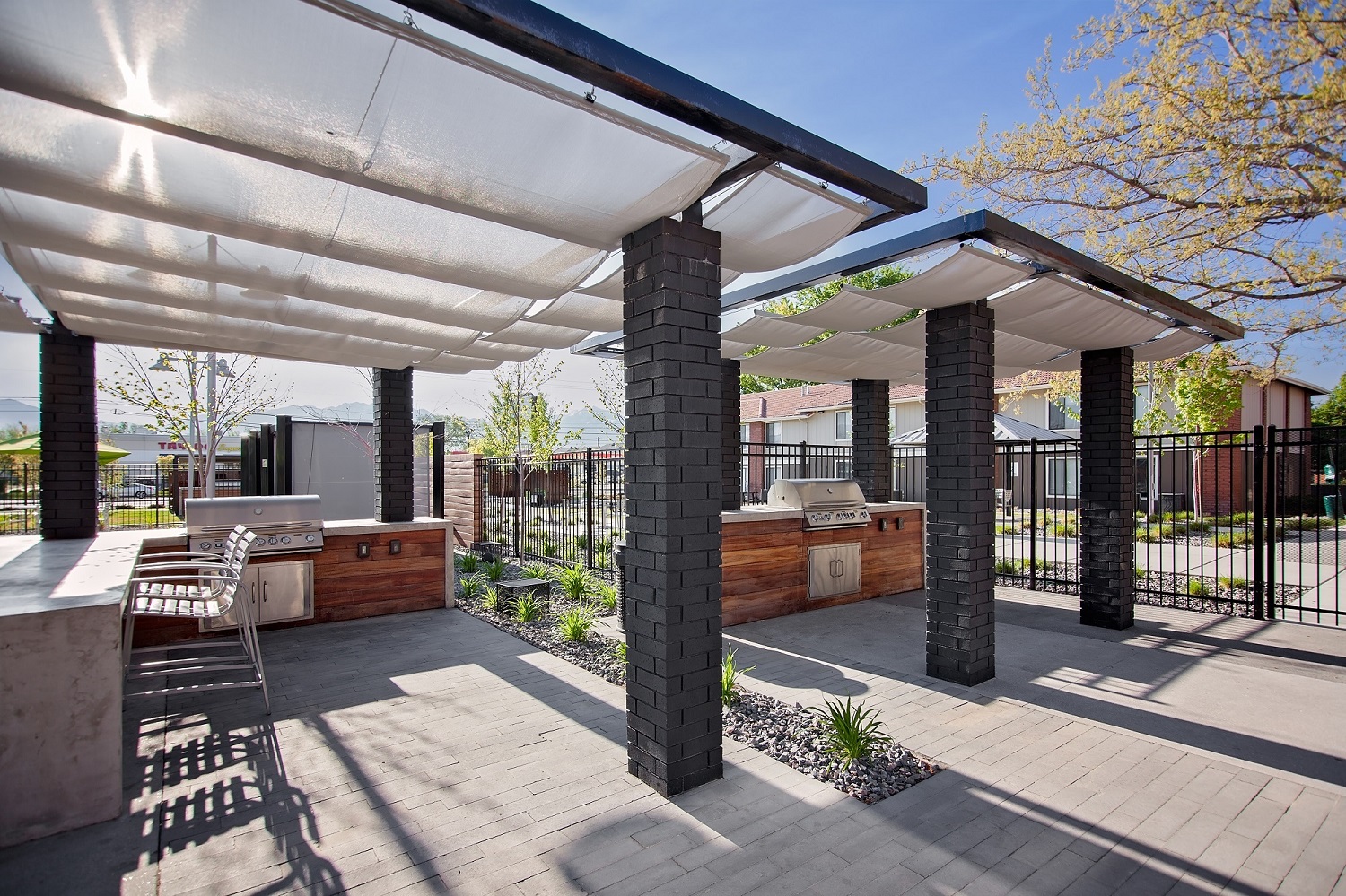 West Valley City, UT Enclave at Redwood apartments courtyard seating are