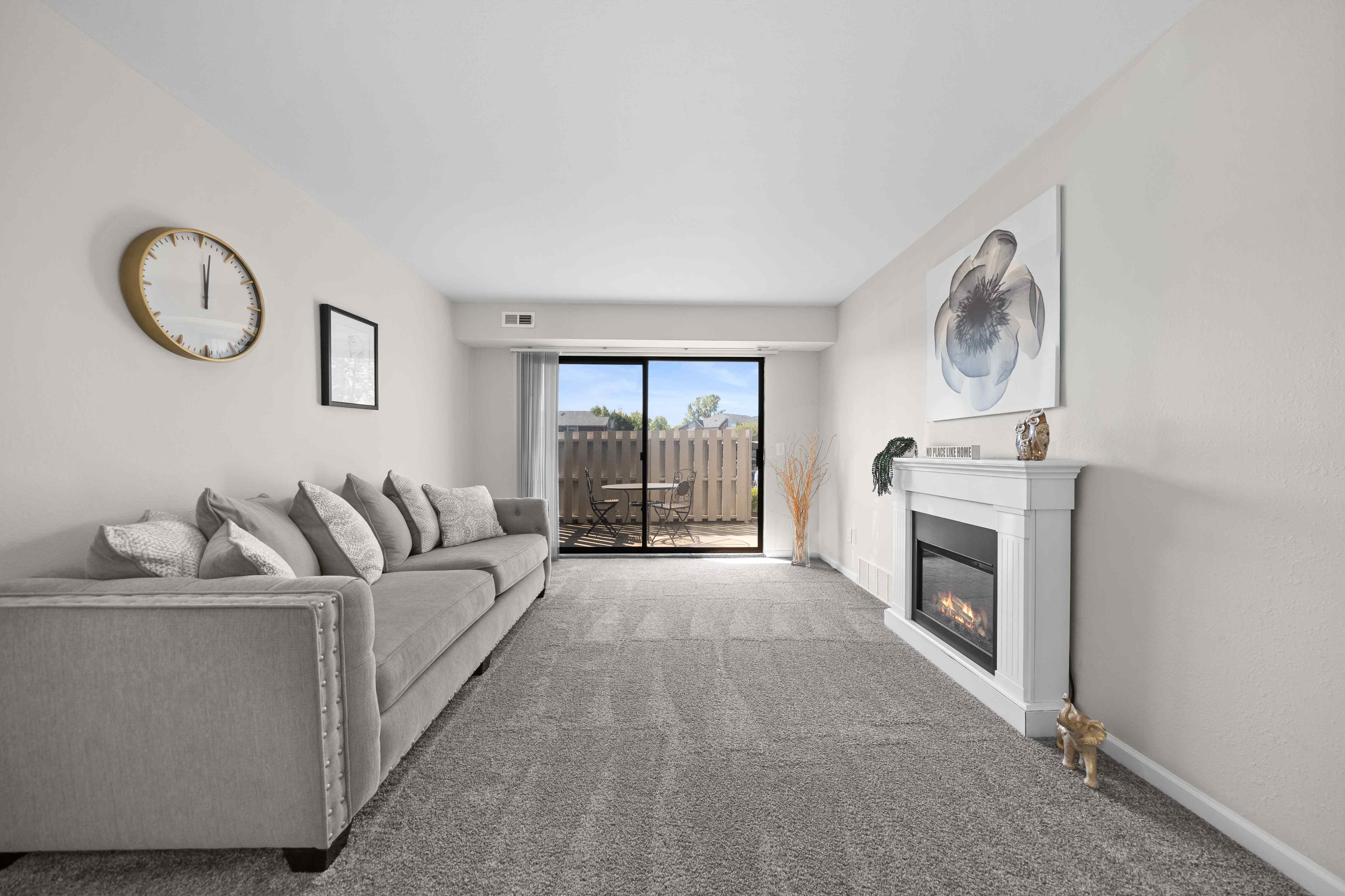 Living Room with Natural lighting  at Three Oaks Apartments in Troy, MI