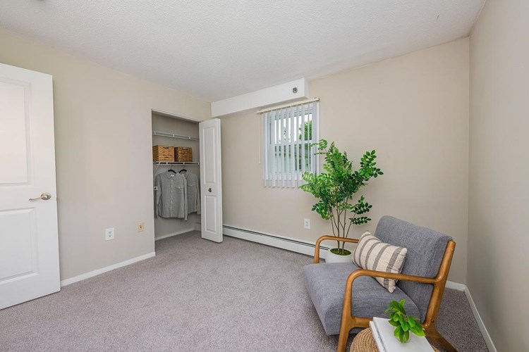 Perfect size bedroom with plush carpeting or wood style flooring throughout.