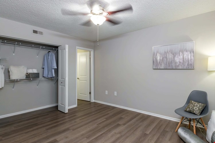 Spacious bedrooms with generous closet space that whisper 'organization' and dreams that say 'home.’