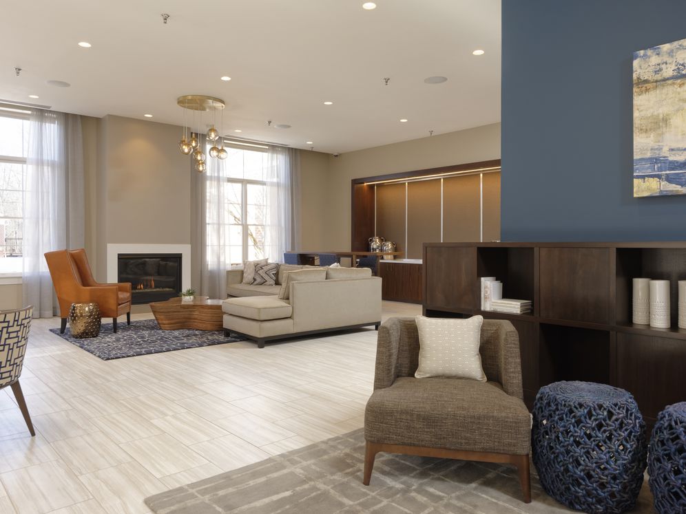 Lobby with common area seating and fireplace