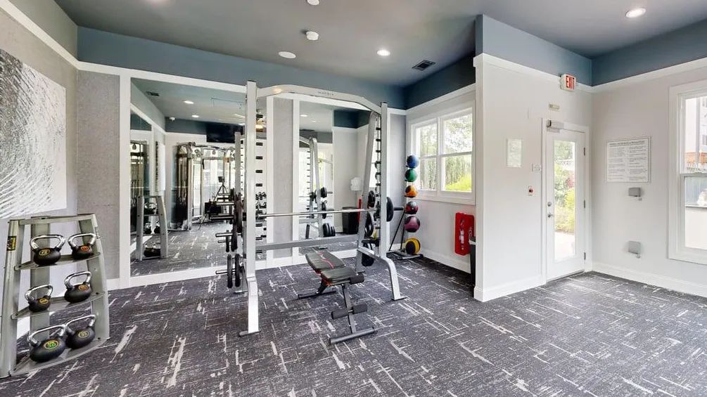 Whether it’s leg day or arm day, this thoughtfully designed gym space has what you need to challenge yourself and stay consistent.