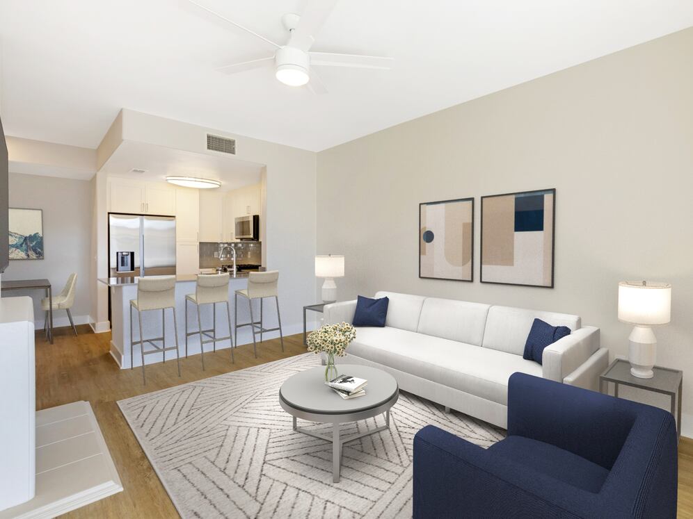 Renovated Package I living room with hard surface flooring