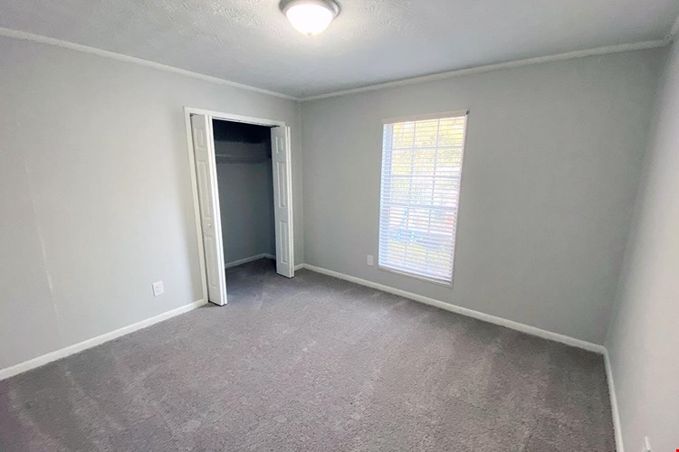 Bedrooms feature spacious closets with built-in organizers.
