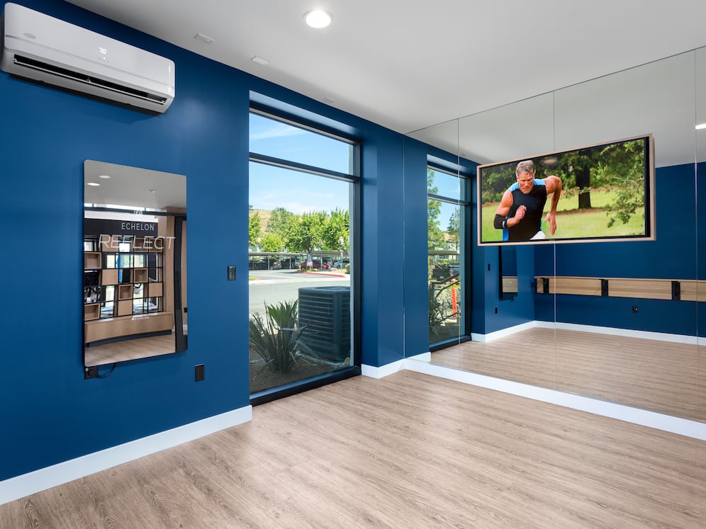Fitness center studio room with Mirror virtual fitness technology
