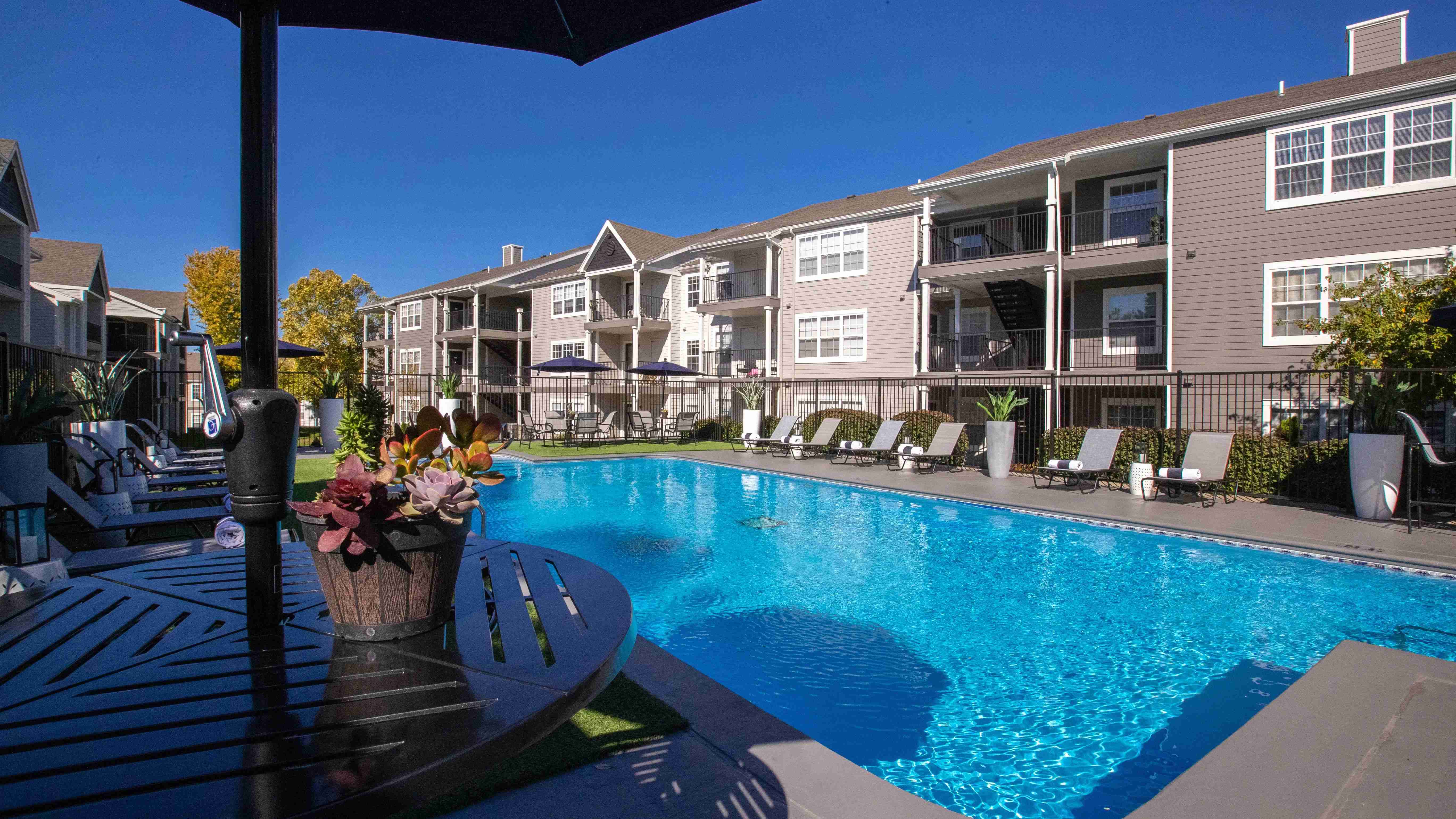 Immerse yourself in the vibrant blue waters of our resort-style pool or bask in the sun's warm embrace on our expansive sundeck. It's your personal oasis of relaxation, where every dip and every lounge promise a slice of paradise.