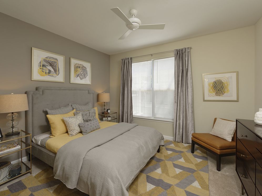 Espresso Finish Package townhome bedroom with carpet and closet