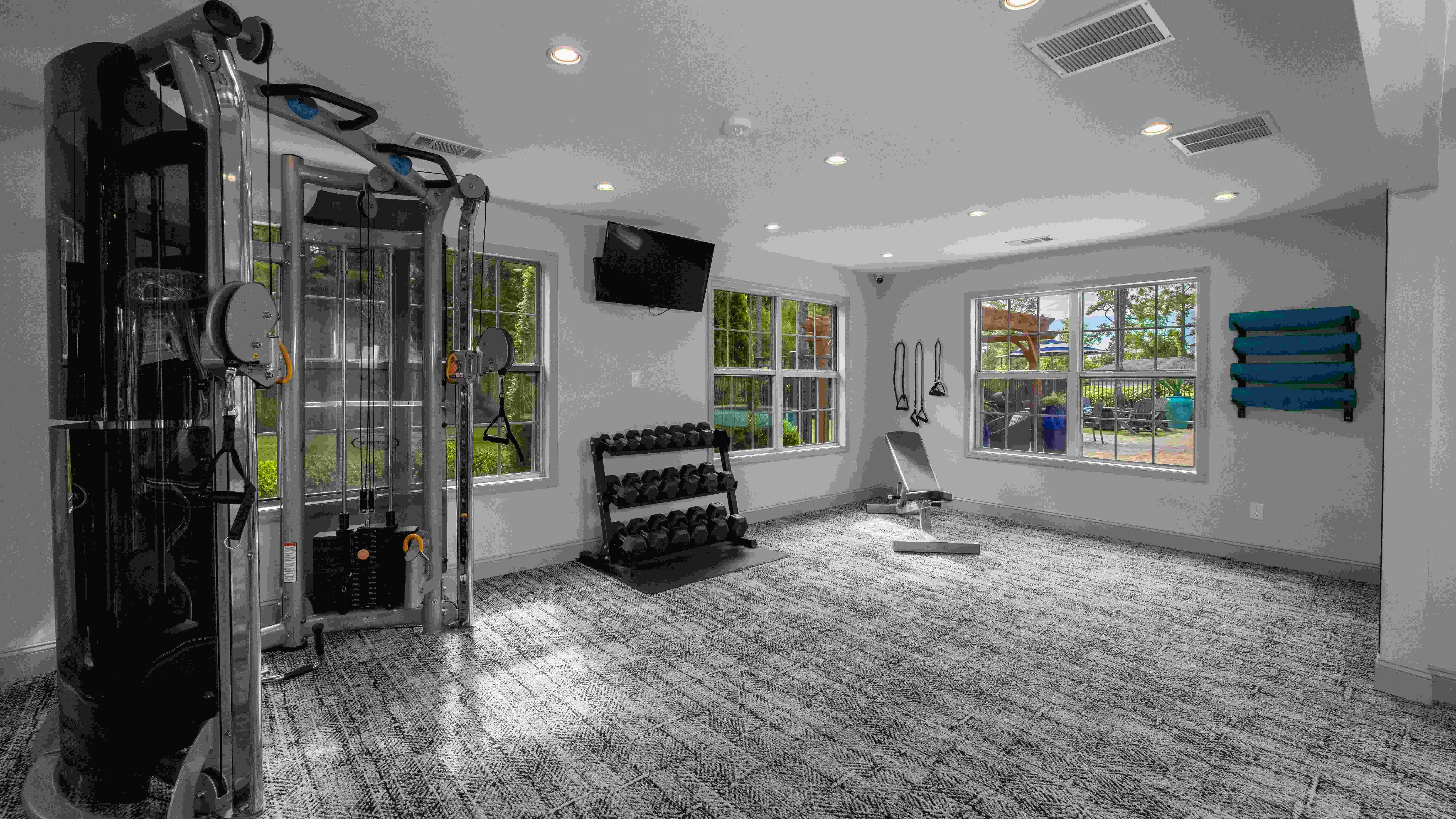 Unleash your strength with comprehensive weight training equipment in our fitness center. 