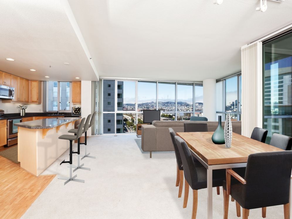 Classic Phase I kitchen, living and dining areas with stainless steel appliances and granite countertops