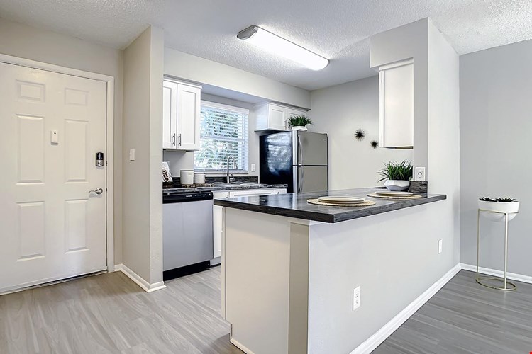 Select floor plans feature large open breakfast bars, perfect for entertaining.