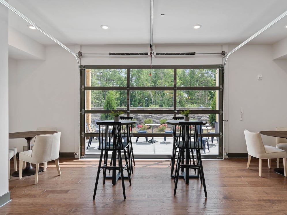 Resident lounge with retractable garage door