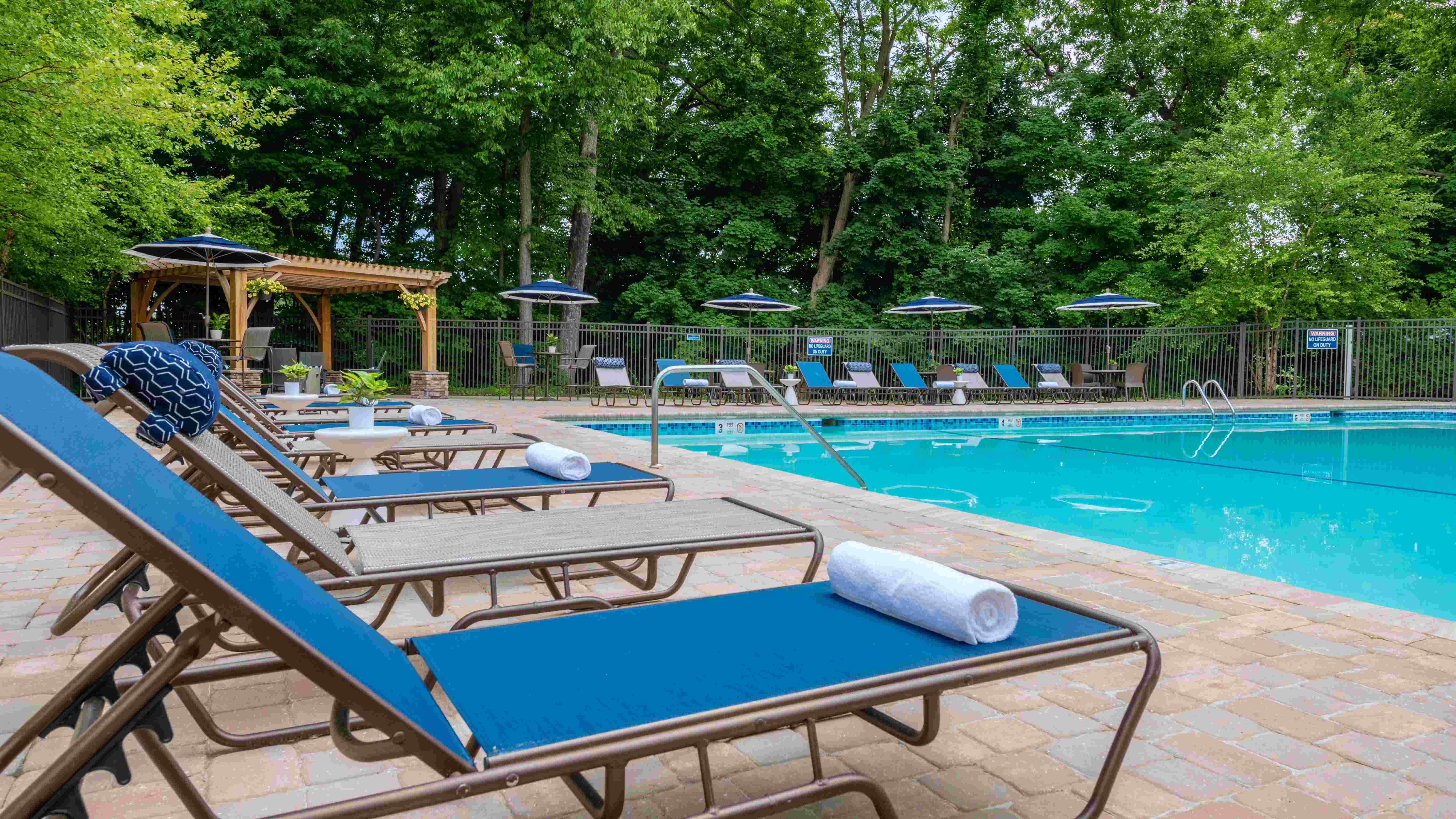  Immerse yourself in a pool of tranquility where relaxation and enjoyment go hand in hand.