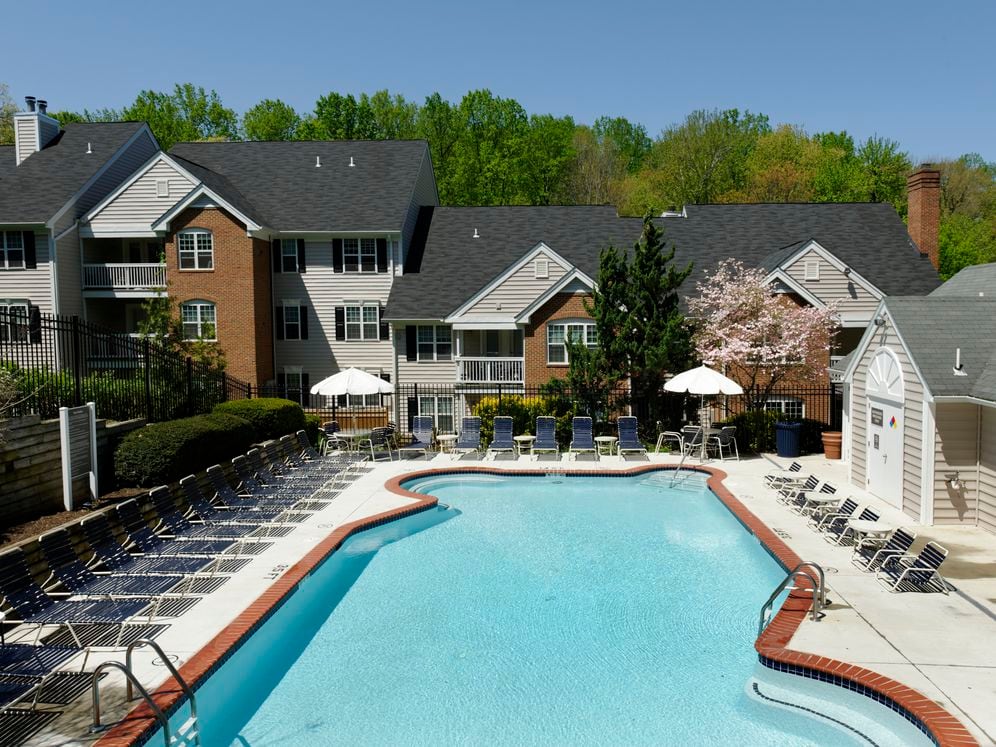 Swimming pool and sundeck with lounge seating