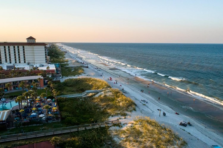With sand between your toes, enjoy restaurants with amazing ocean views and a relaxed walk on Jacksonville Beach.