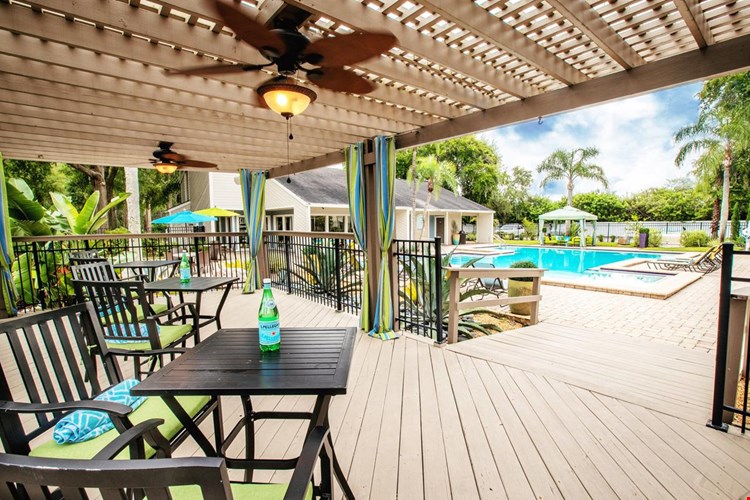 Relax in the shade in our outdoor lounge located next to the pool.